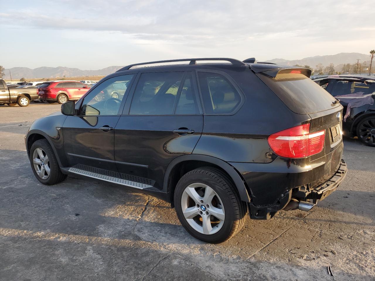 2010 BMW X5 VIN 5UXFE4C56AL379658 Copart auction photo, rear end damage thumbnail 2