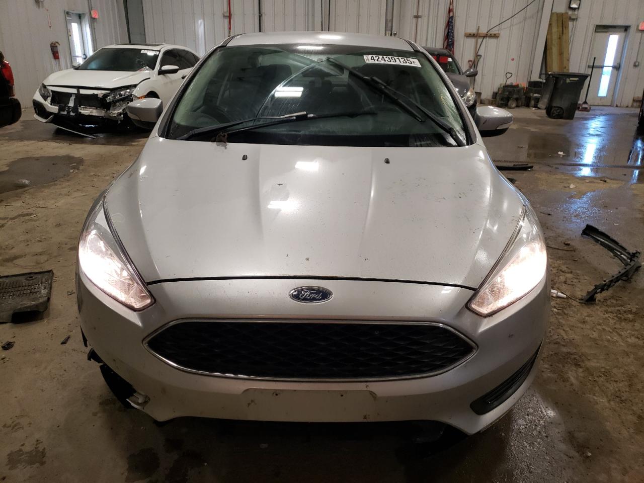 2016 Ford Focus VIN 1FADP3F26GL324107 Copart auction photo, rear end / front end damage thumbnail 5