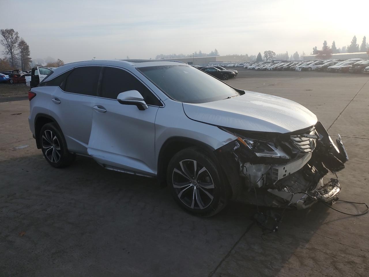 2017 Lexus RX VIN 2T2BZMCA0HC096784 Copart auction photo, all over damage thumbnail 4