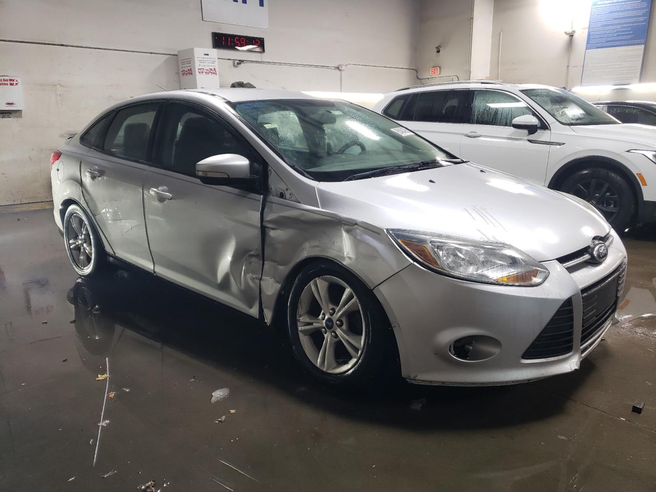 2014 Ford Focus VIN 1FADP3F25EL417651 Copart auction photo, front end / side damage thumbnail 4