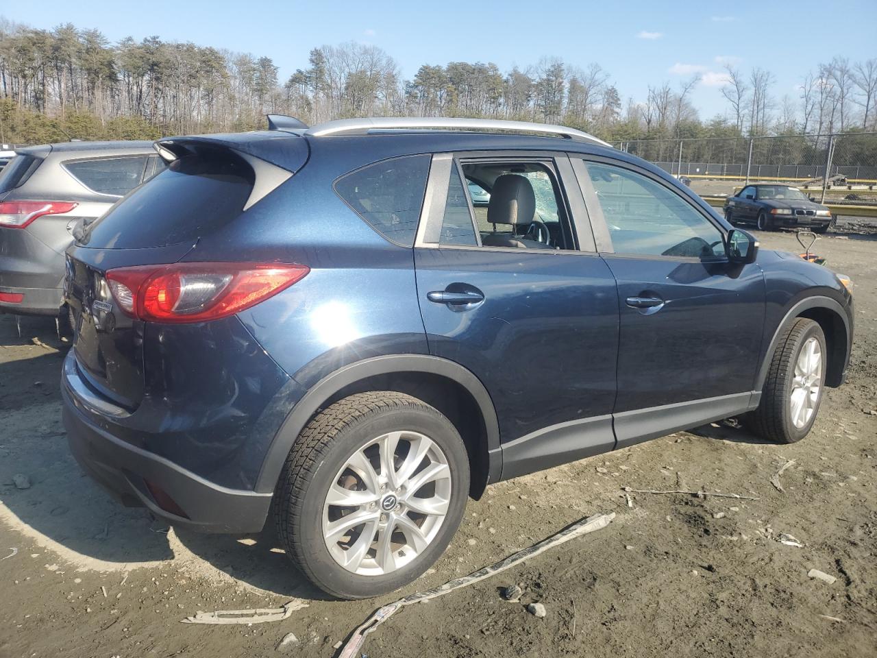 2015 Mazda CX-5 VIN JM3KE4DY0F0480770 Copart auction photo, front end / side damage thumbnail 3