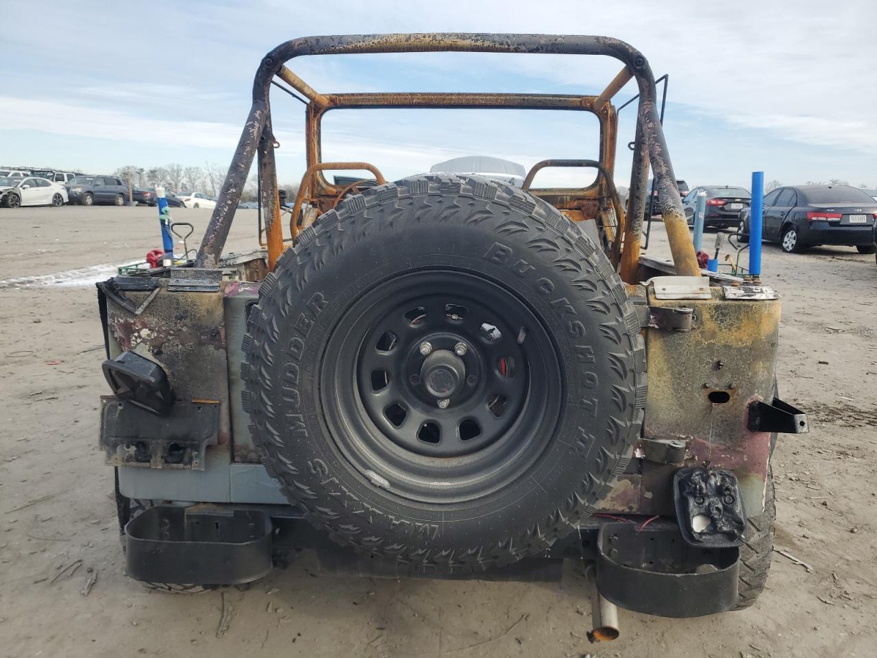 1990 Jeep Wrangler VIN 2J4FY19E1LJ550785 Copart auction photo, burn damage thumbnail 6