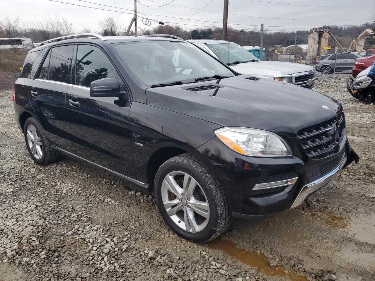 2012 Mercedes-Benz M-klasse VIN 4JGDA5HB4CA021817 Copart auction photo, front end damage thumbnail 4