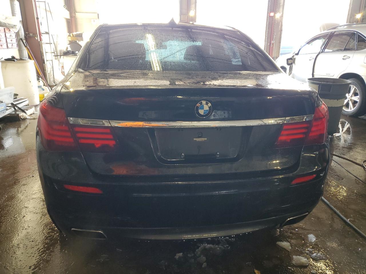2014 BMW 7er VIN WBAYF8C59ED141718 Copart auction photo, front end / side damage thumbnail 6
