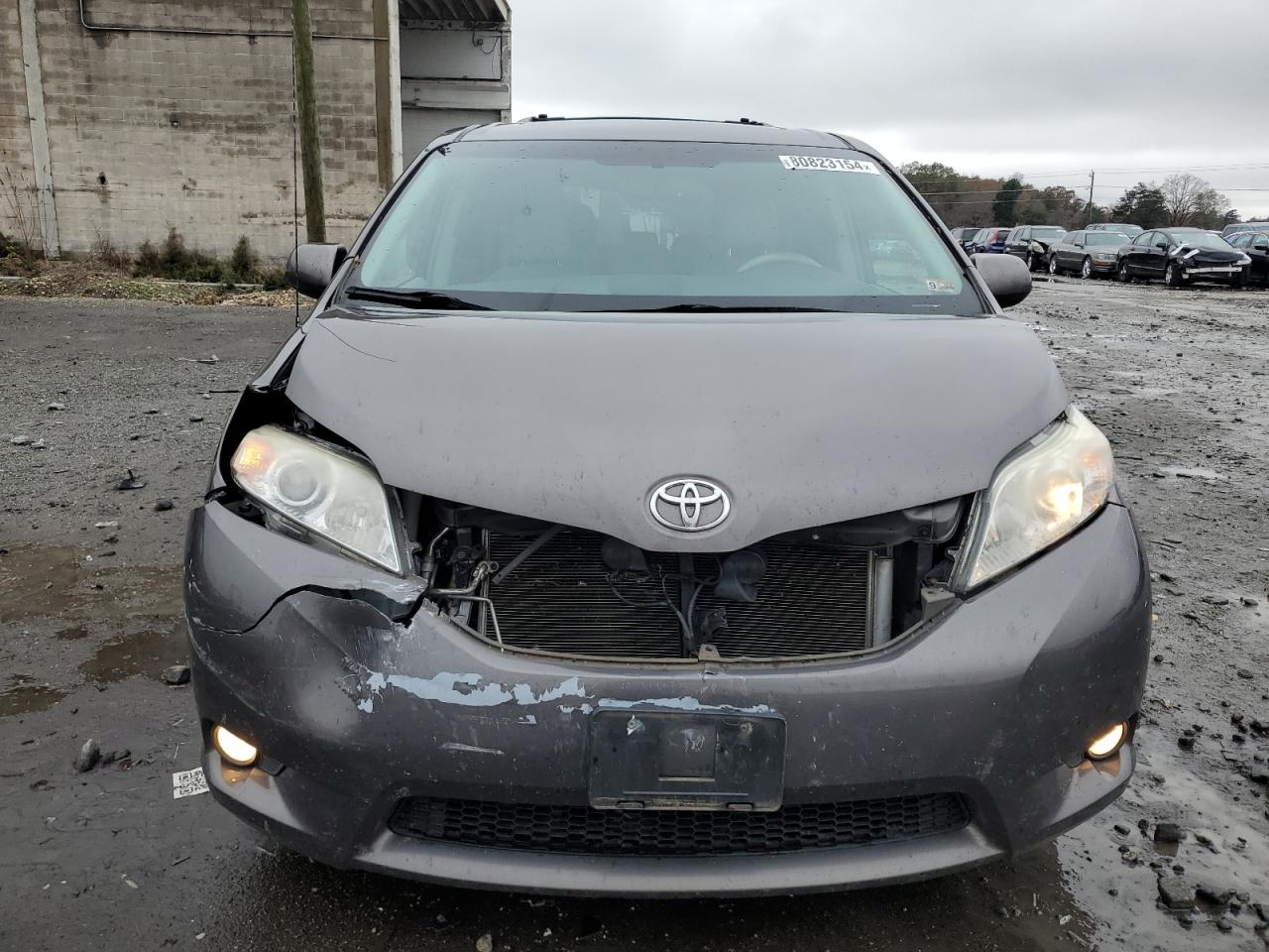 2012 Toyota Sienna VIN 5TDYK3DCXCS275783 Copart auction photo, front end / minor dent/scratches damage thumbnail 5