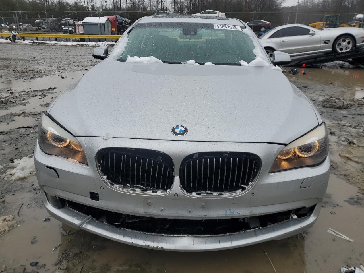 2011 BMW 7er VIN WBAKC8C54BC431767 Copart auction photo, front end damage thumbnail 5