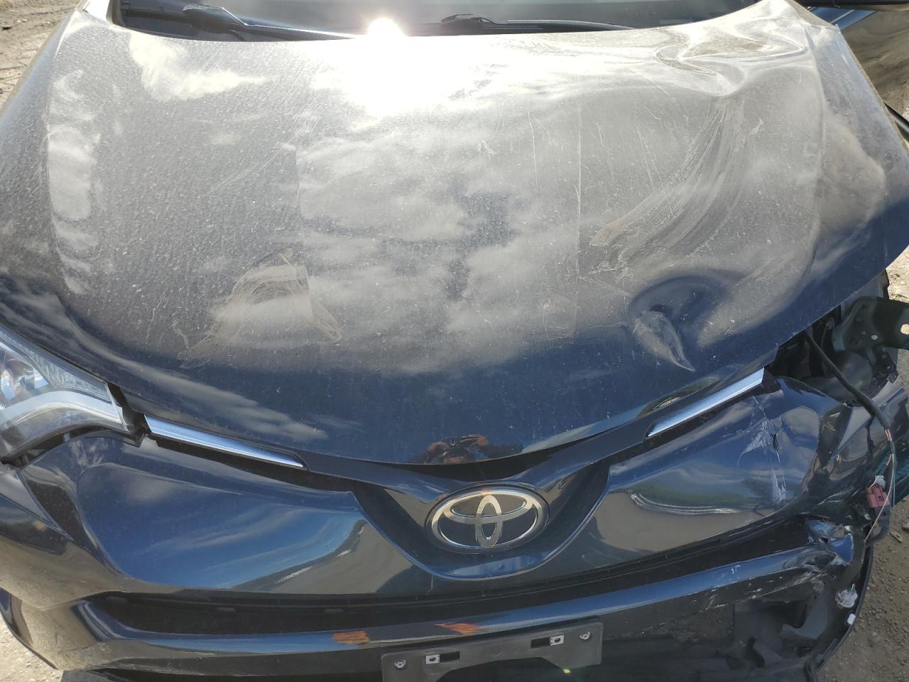 2018 Toyota RAV 4 VIN 2T3BFREV6JW835355 Copart auction photo, front end / minor dent/scratches damage thumbnail 14