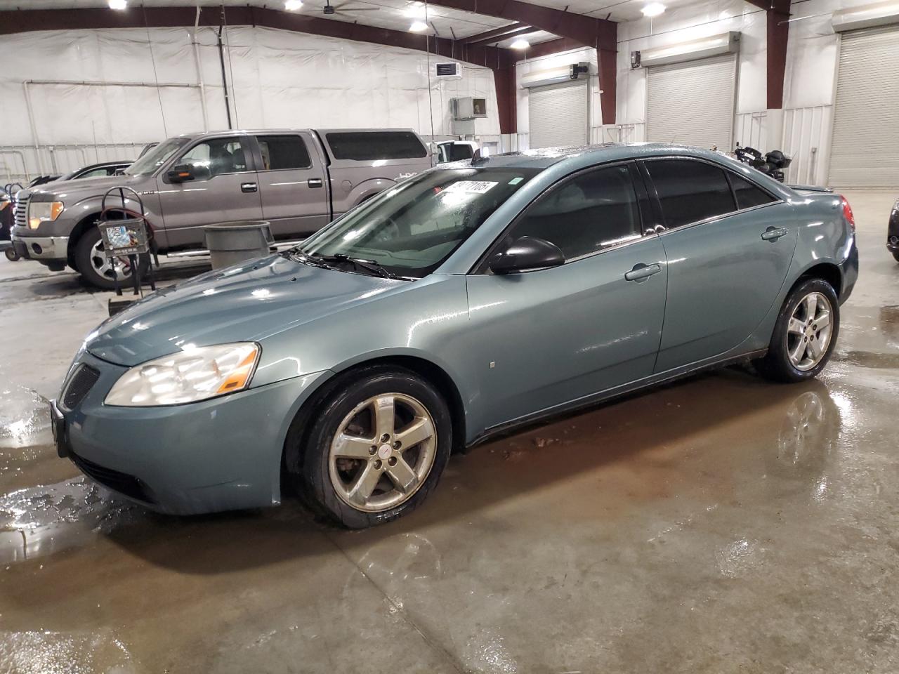 2009 Pontiac G6 VIN 1G2ZG57N694205382 - Copart auction photo