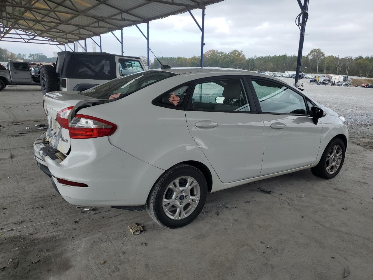 2016 Ford Fiesta VIN 3FADP4BJXGM202903 Copart auction photo, rear end / minor dent/scratches damage thumbnail 3