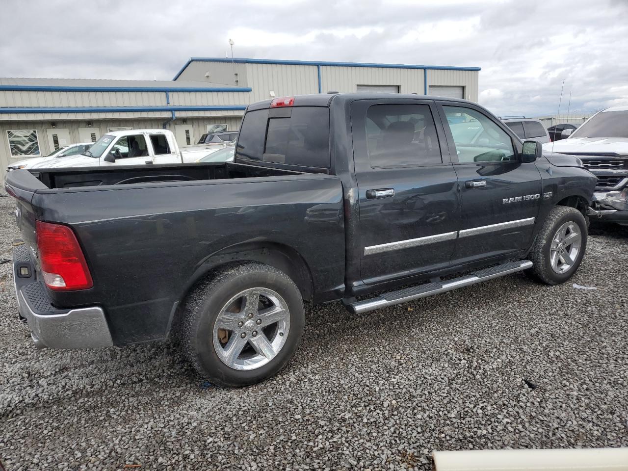2011 Dodge RAM VIN 1D7RV1CT2BS631172 Copart auction photo, front end / minor dent/scratches damage thumbnail 3