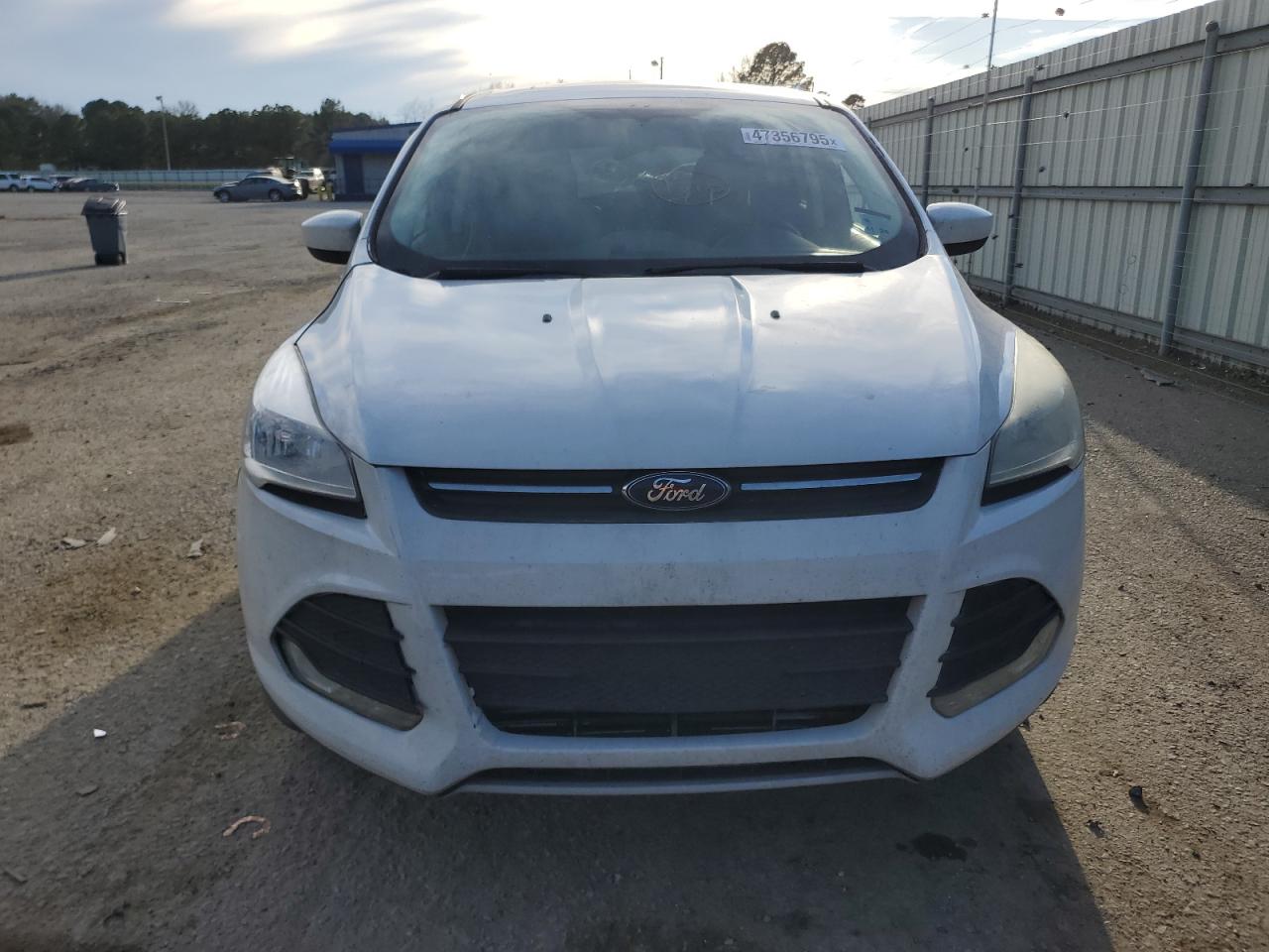 2015 Ford Escape VIN 1FMCU9GX6FUC28638 Copart auction photo, side / minor dent/scratches damage thumbnail 5