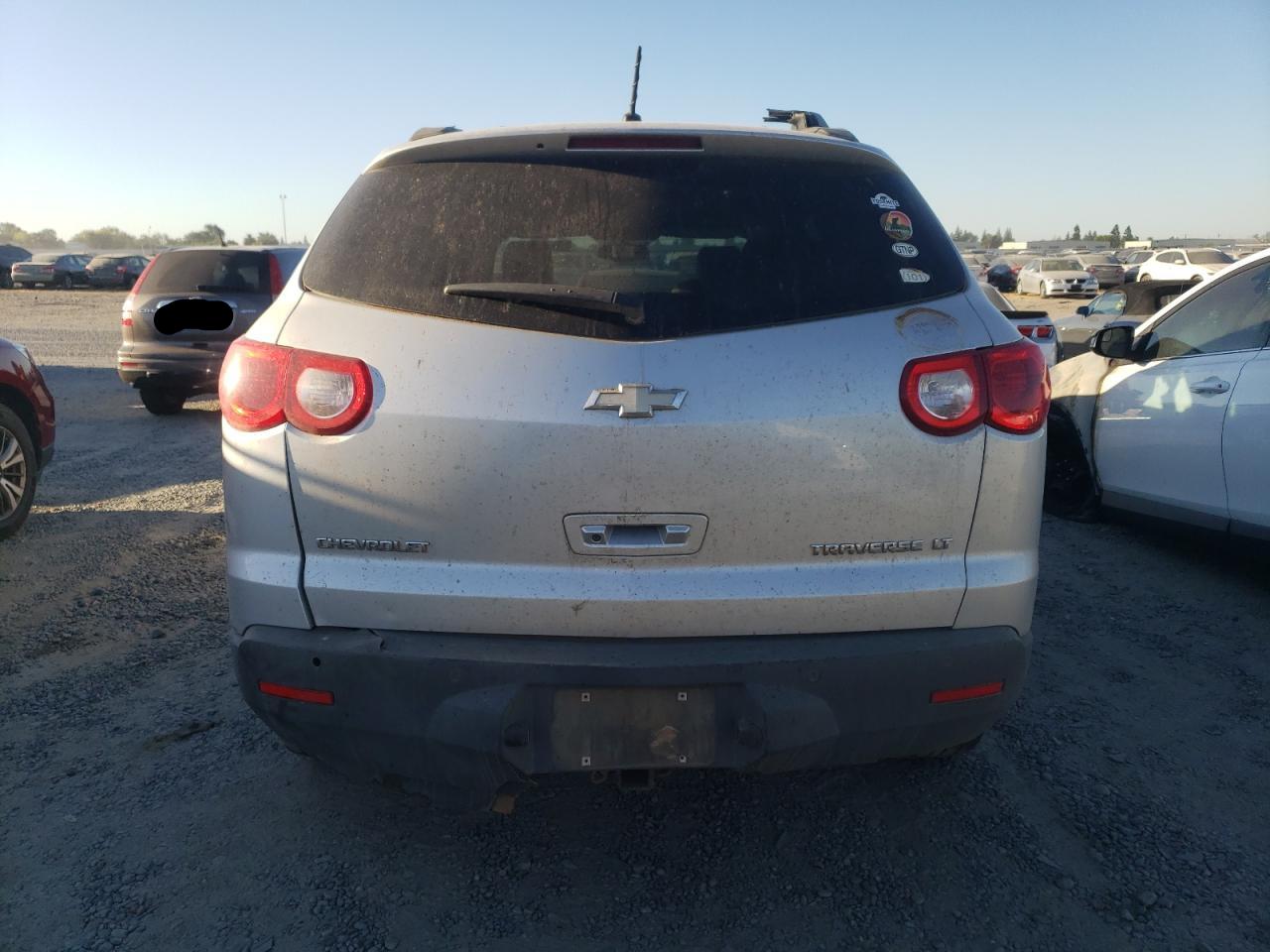 2010 Chevrolet Traverse VIN 1GNLVGED7AS111838 Copart auction photo, rollover damage thumbnail 6