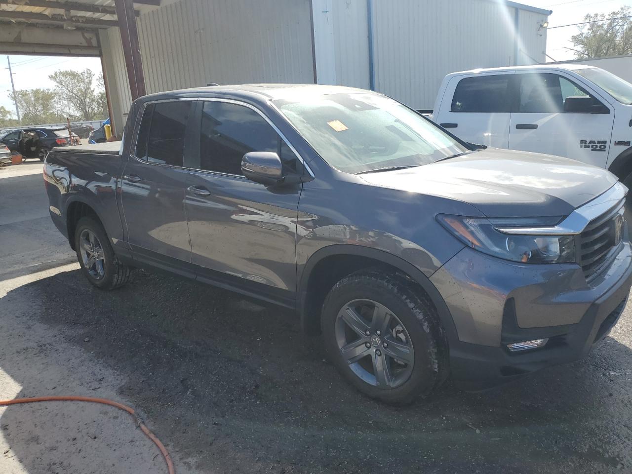 2022 Honda Ridgeline VIN 5FPYK3F54NB013058 Copart auction photo, water/flood damage thumbnail 4