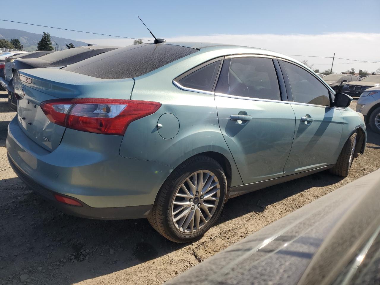 2012 Ford Focus VIN 1FAHP3H25CL304987 Copart auction photo, front end damage thumbnail 3