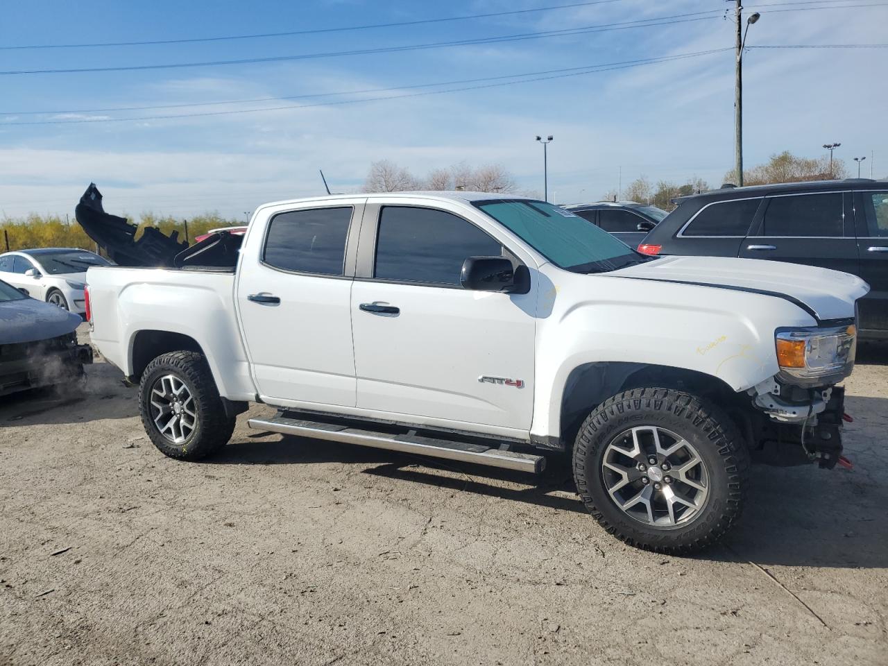 2021 GMC Canyon VIN 1GTG6FEN8M1196239 Copart auction photo, rear end / minor dent/scratches damage thumbnail 4