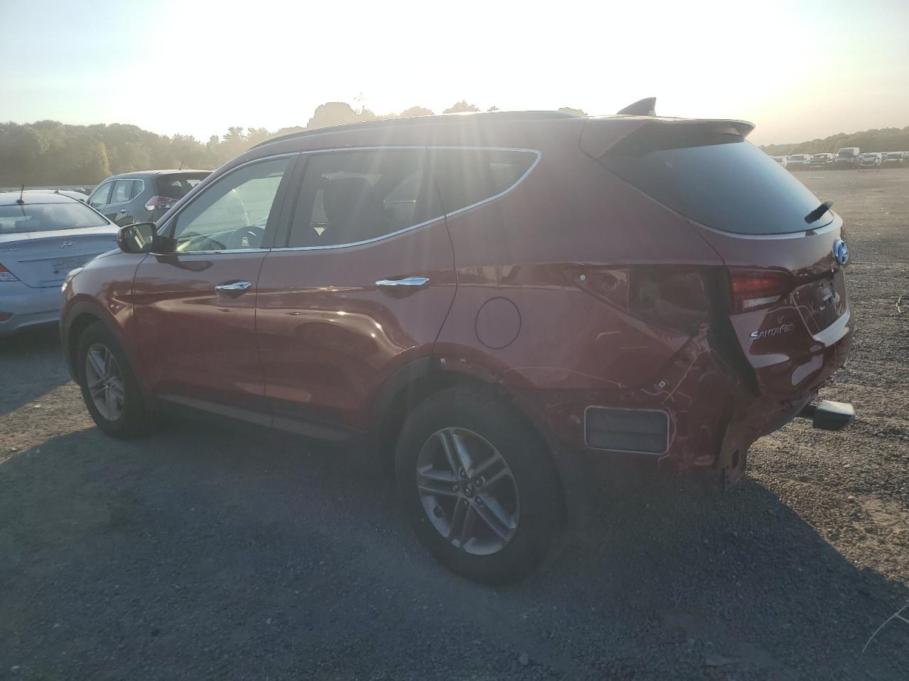 2017 Hyundai Santa Fe VIN 5XYZUDL89HG394054 Copart auction photo, rear end / minor dent/scratches damage thumbnail 2