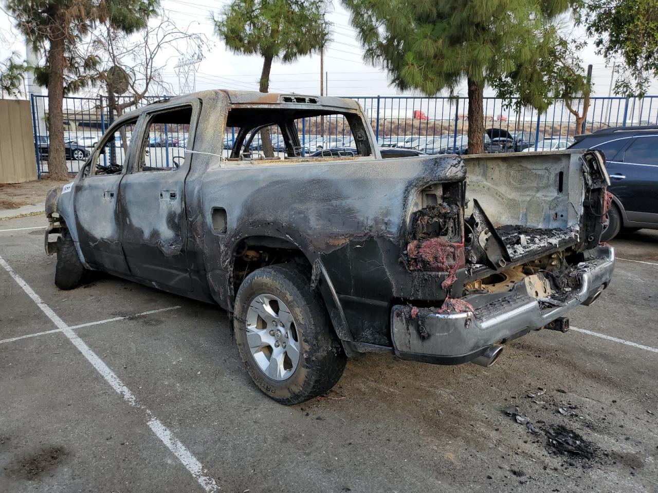 2020 RAM 1500 VIN 1C6SRFJMXLN250010 Copart auction photo, burn damage thumbnail 2