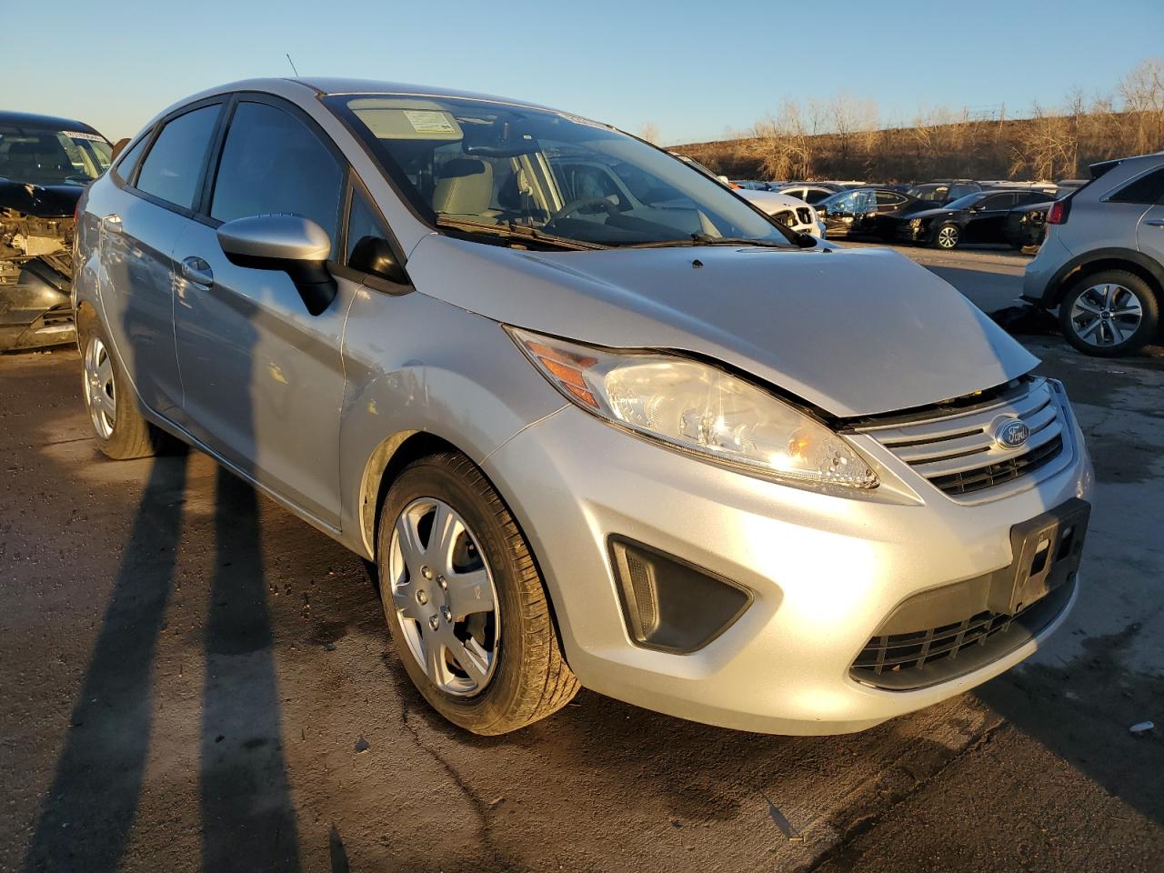 2012 Ford Fiesta VIN 3FADP4AJXCM150815 Copart auction photo, front end / side damage thumbnail 4
