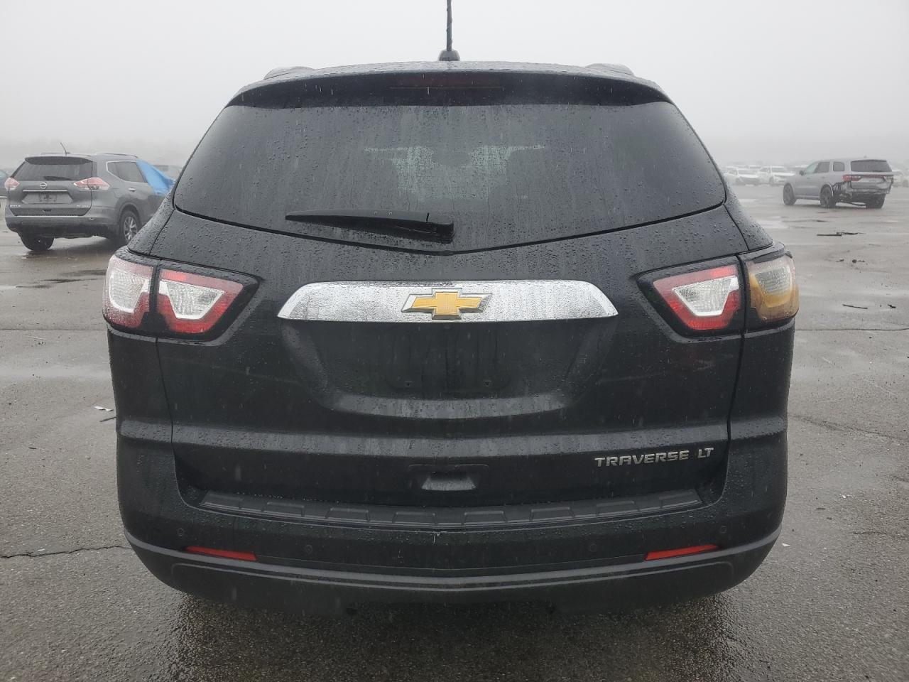 2016 Chevrolet Traverse VIN 1GNKRGKD6GJ317624 Copart auction photo, front end / minor dent/scratches damage thumbnail 6