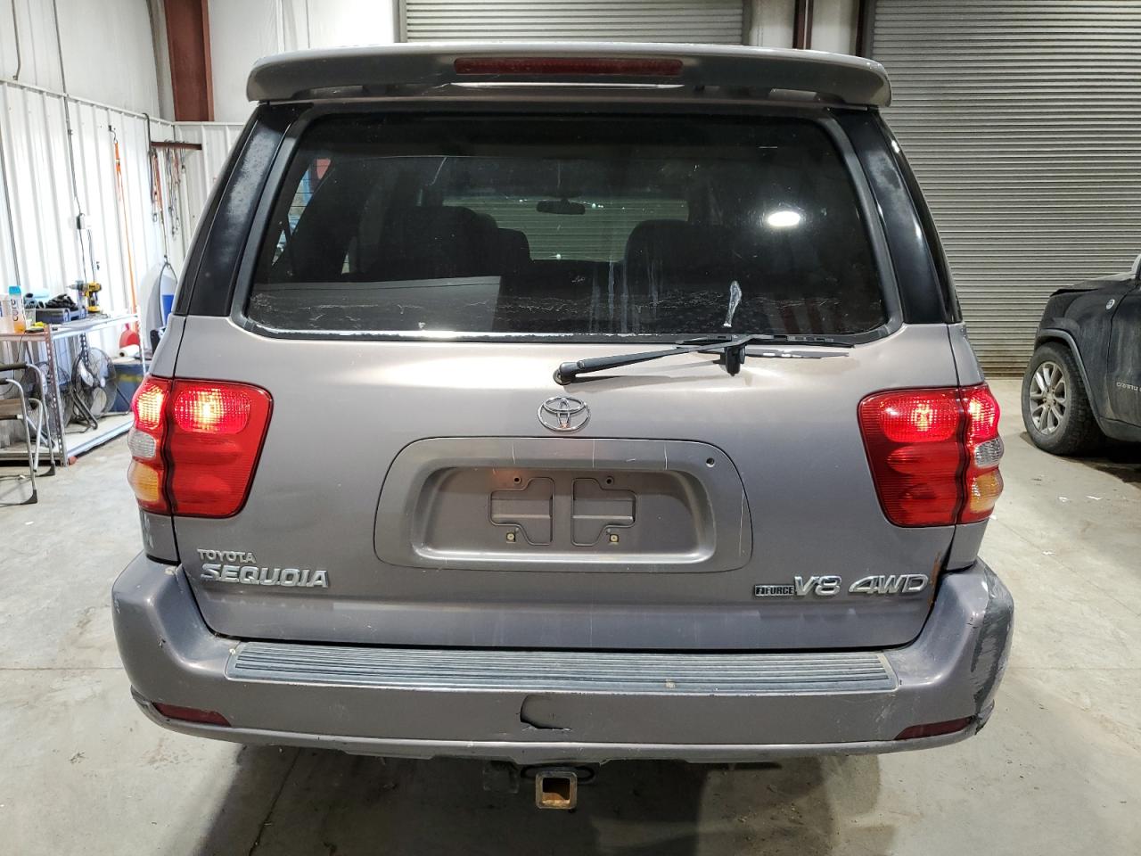 2001 Toyota Sequoia VIN 5TDBT48A11S026819 Copart auction photo, front end / rear end damage thumbnail 6