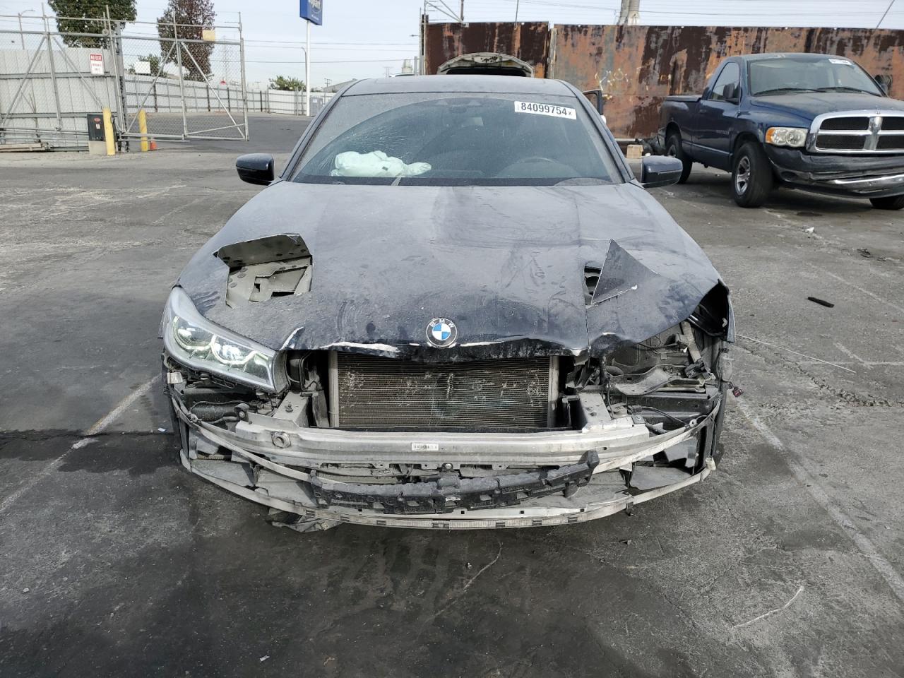 2018 BMW 7er VIN WBA7F2C53JG424066 Copart auction photo, front end / minor dent/scratches damage thumbnail 5