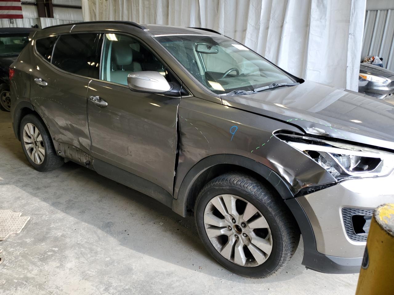 2015 Hyundai Santa Fe VIN 5XYZUDLA5FG265023 Copart auction photo, front end / side damage thumbnail 4