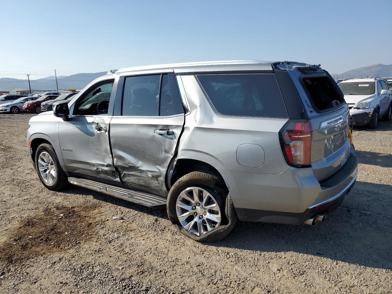 2023 Chevrolet Tahoe VIN 1GNSCSKDXPR341740 Copart auction photo, side / rear end damage thumbnail 2