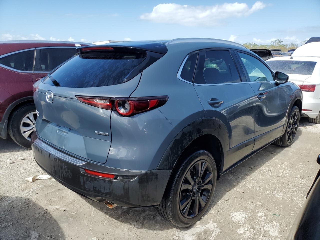 2022 Mazda CX-30 VIN 3MVDMBCL1NM407710 Copart auction photo, water/flood damage thumbnail 3