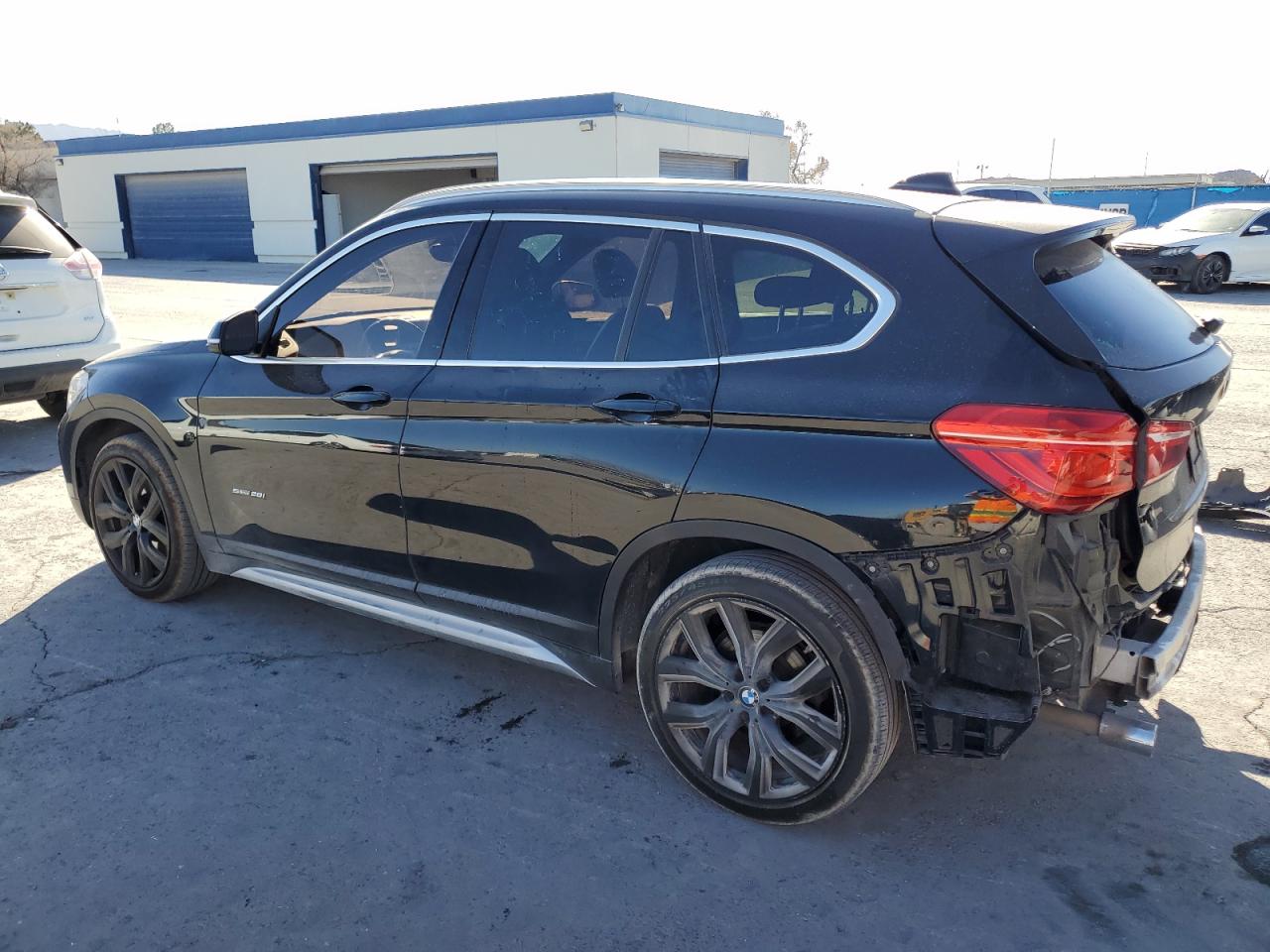 2018 BMW X1 VIN WBXHU7C30J5H43533 Copart auction photo, rear end damage thumbnail 2