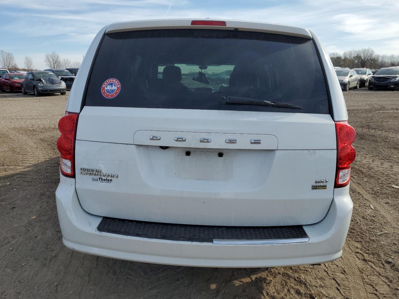 2019 Dodge Caravan VIN 2C4RDGCG5KR564488 Copart auction photo, side / front end damage thumbnail 6
