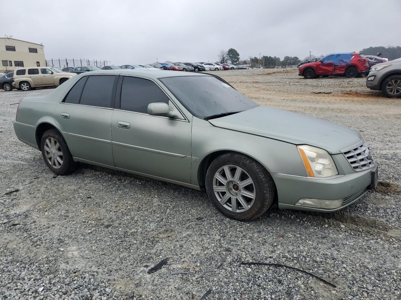 2006 Cadillac DTS VIN 1G6KD57YX6U193025 Copart auction photo, all over damage thumbnail 4