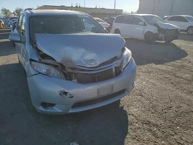 2015 Toyota Sienna VIN 5TDKK3DC7FS669509 Copart auction photo, front end / side damage thumbnail 12