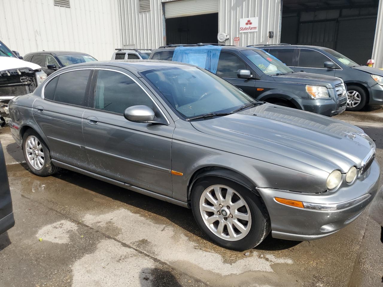 2002 Jaguar X-Type VIN SAJEA51D12XC84576 Copart auction photo, rear end damage thumbnail 4
