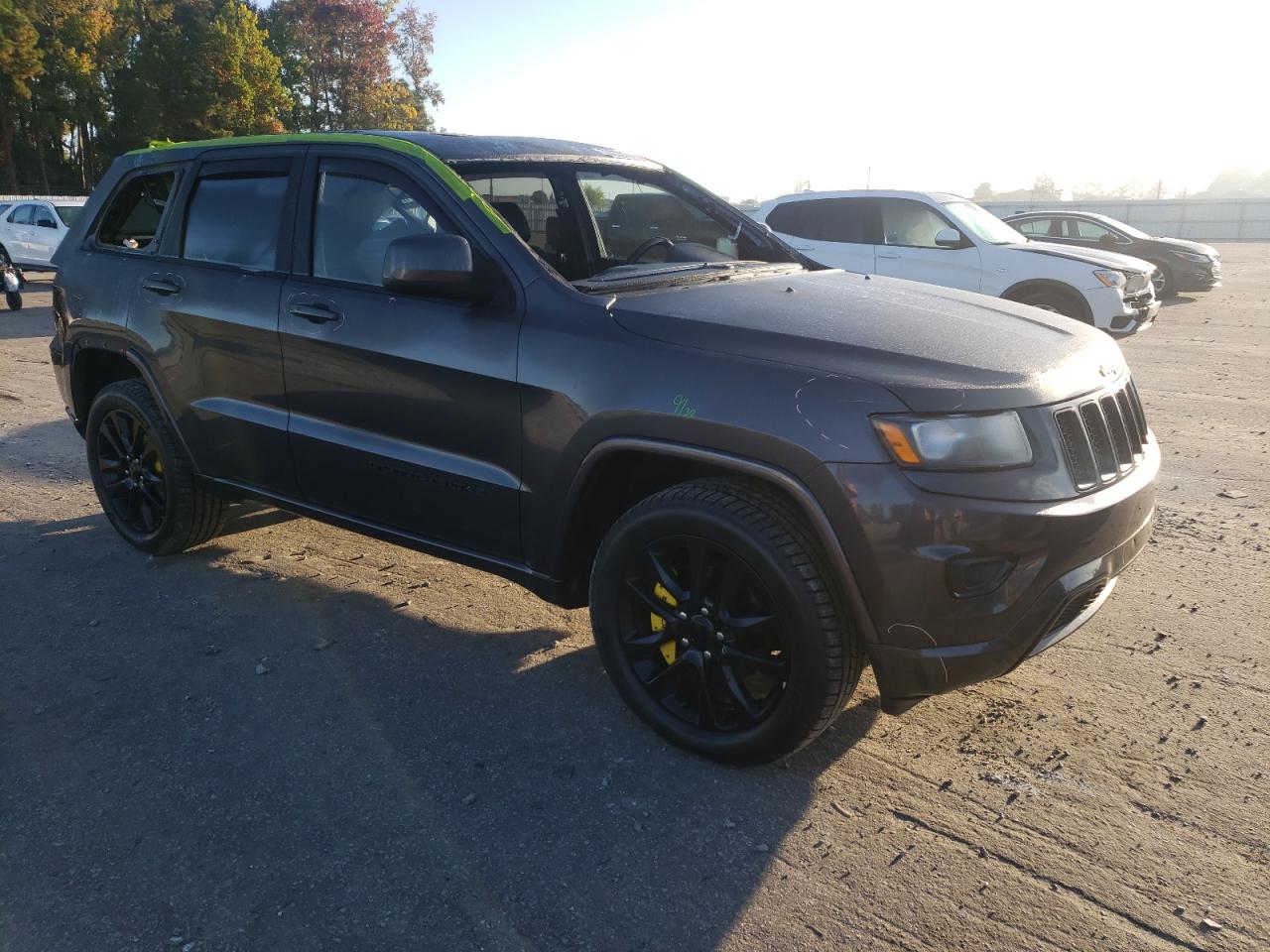 2015 Jeep Grand Cherokee VIN 1C4RJFAG0FC115482 Copart auction photo, all over damage thumbnail 4