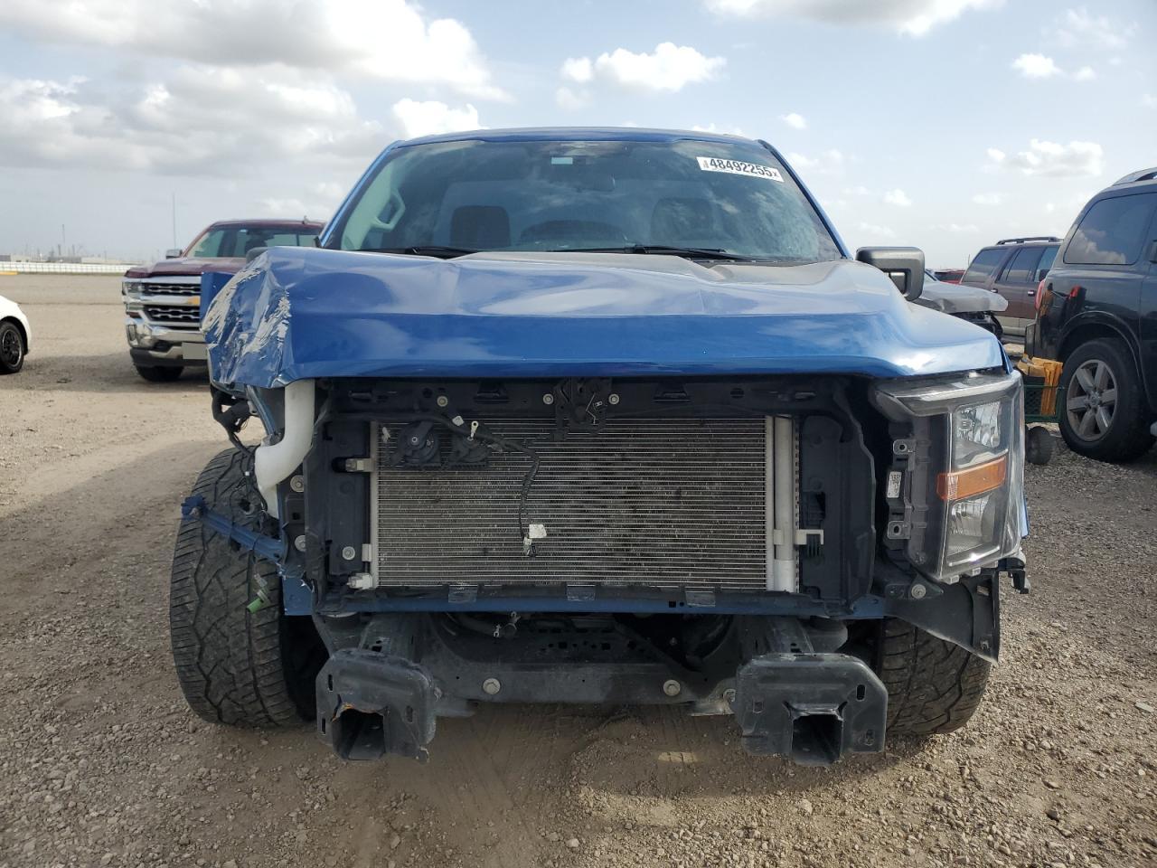 2023 Ford F-150 VIN 1FTMF1C57PKF39081 Copart auction photo, front end damage thumbnail 5