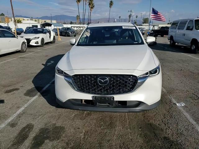 2022 Mazda CX-5 VIN JM3KFBBM9N0565526 Copart auction photo, rear end / minor dent/scratches damage thumbnail 11