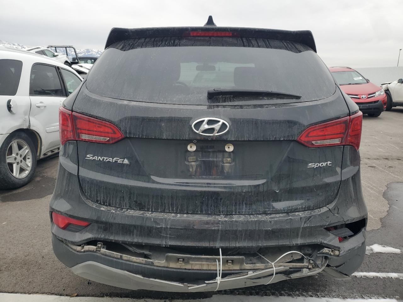2017 Hyundai Santa Fe VIN 5NMZT3LB4HH022057 Copart auction photo, rear end damage thumbnail 6