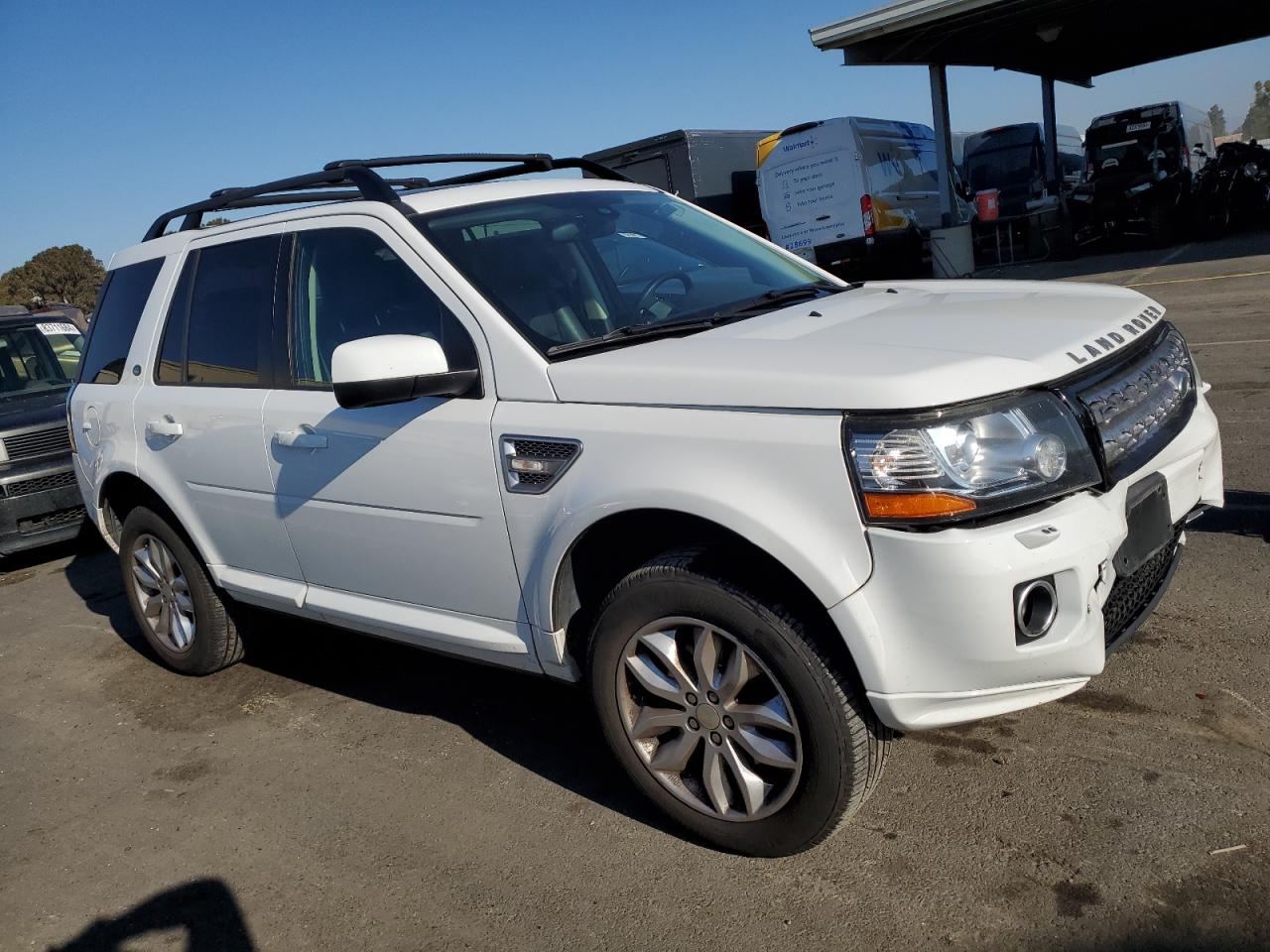 2014 Land Rover LR2 VIN SALFR2BG3EH412727 Copart auction photo, front end / undercarriage damage thumbnail 4