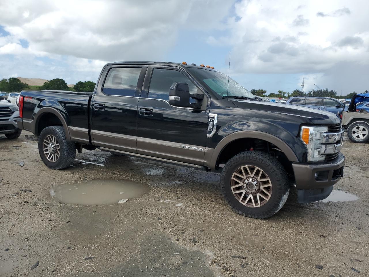 2017 Ford F350 VIN 1FT8W3BT1HEC75711 Copart auction photo, side / minor dent/scratches damage thumbnail 4