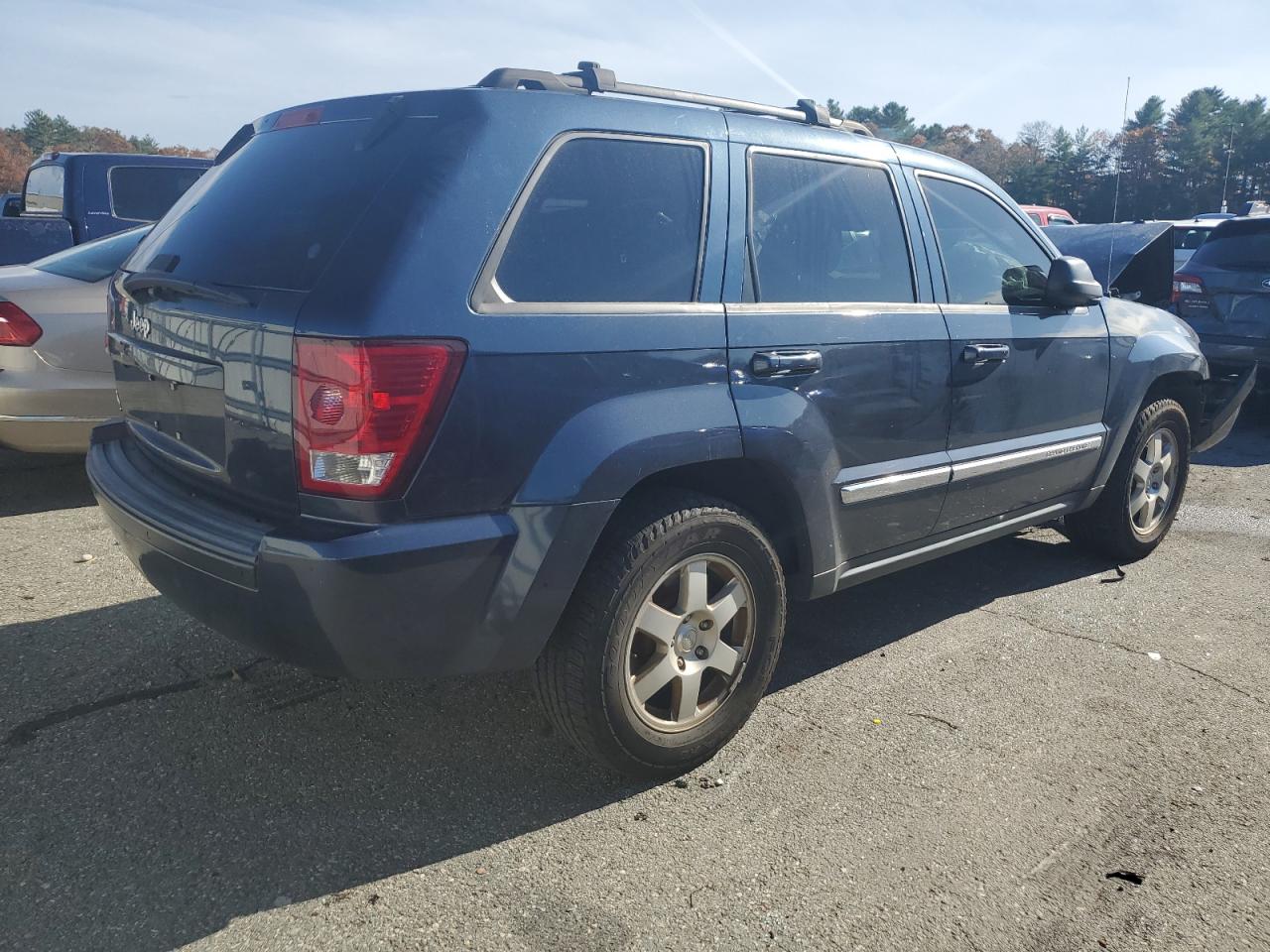 2010 Jeep Grand Cherokee VIN 1J4PR4GK5AC147766 Copart auction photo, front end / minor dent/scratches damage thumbnail 3