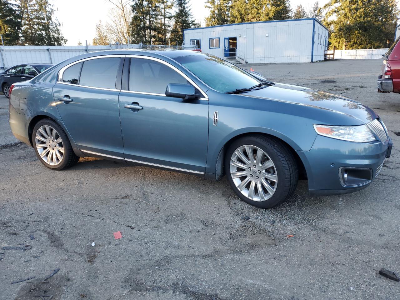 2010 Lincoln MKS VIN 1LNHL9FT7AG600440 Copart auction photo, water/flood damage thumbnail 4