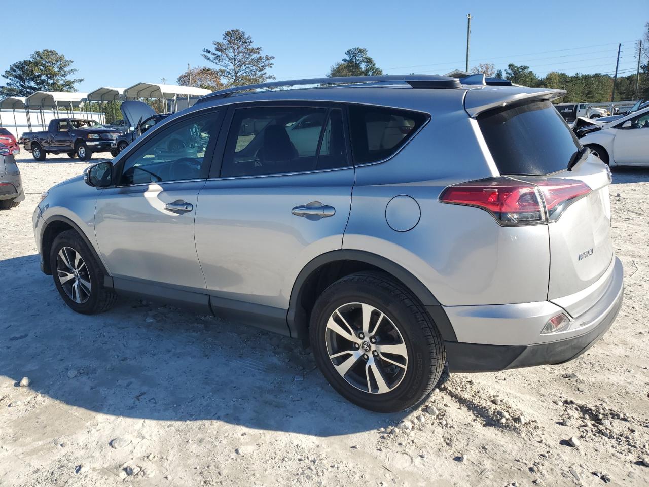 2017 Toyota RAV 4 VIN 2T3RFREV7HW562905 Copart auction photo, side damage thumbnail 2