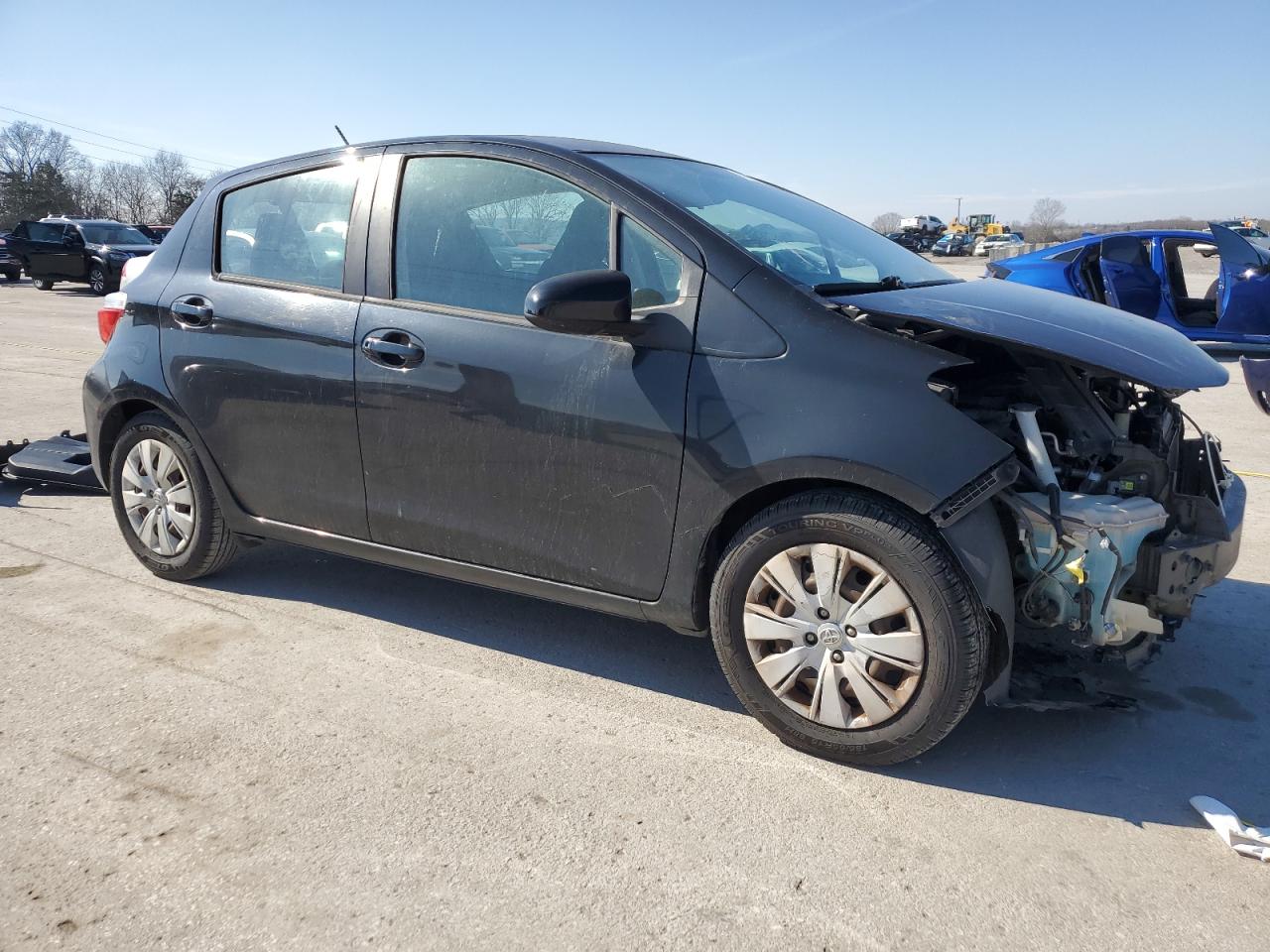 2014 Toyota Yaris VIN VNKKTUD37EA012957 Copart auction photo, front end / side damage thumbnail 4