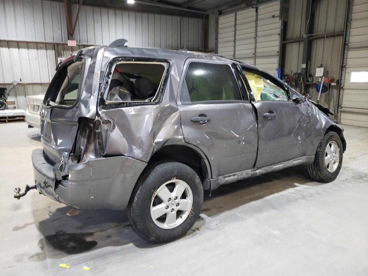 2009 Ford Escape VIN 1FMCU03GX9KC21063 Copart auction photo, rollover damage thumbnail 3