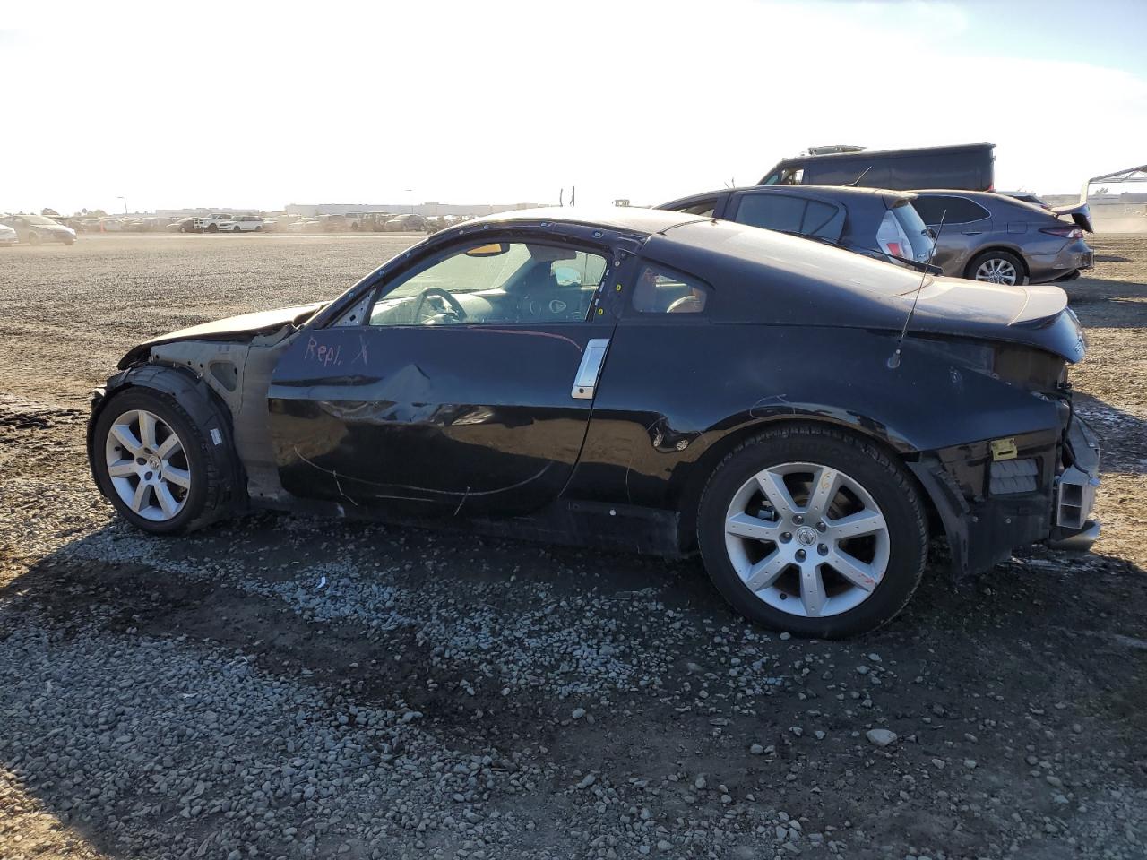 2004 Nissan 350Z VIN JN1AZ34EX4T051630 Copart auction photo, front end / rear end damage thumbnail 2