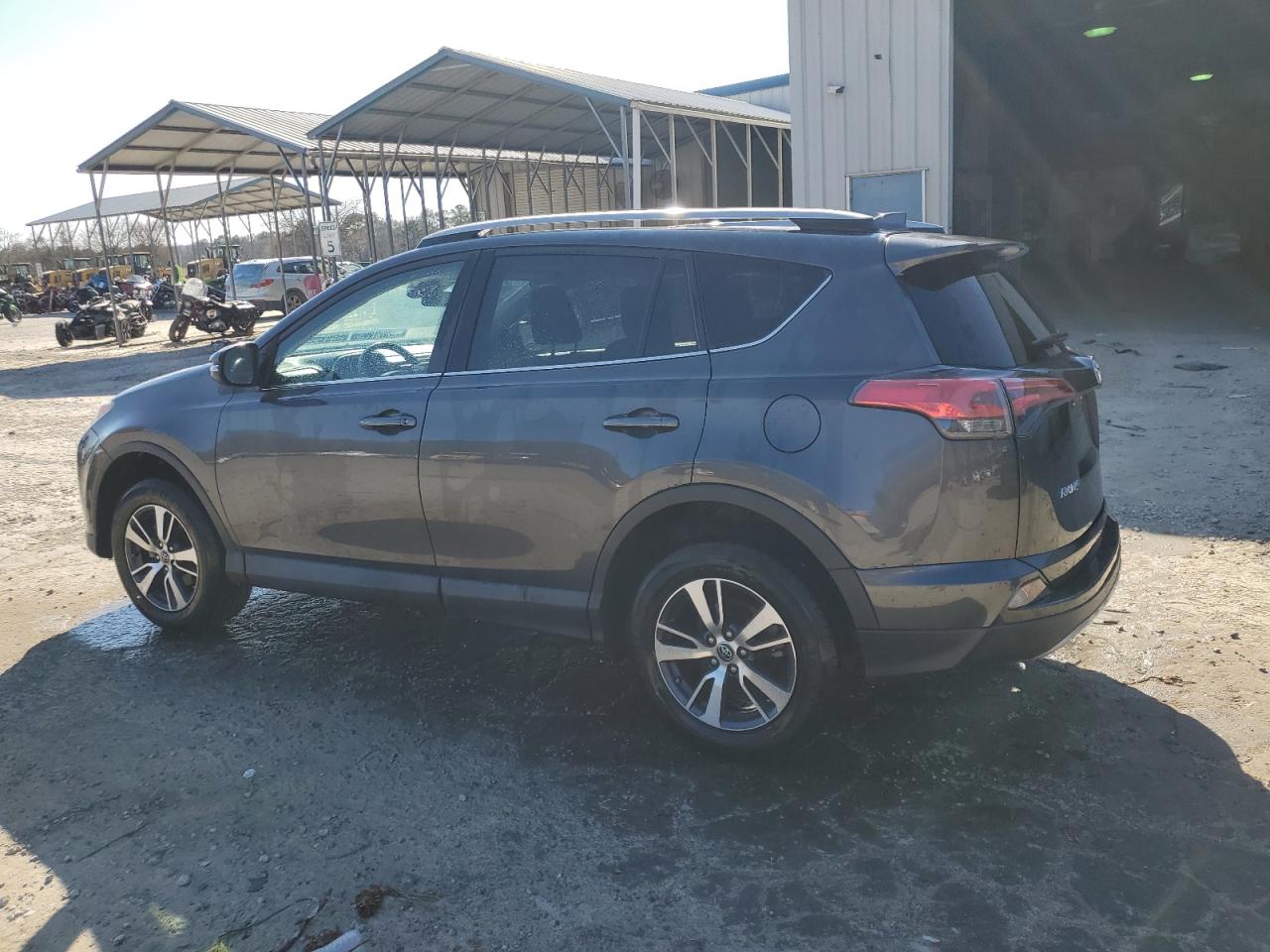 2018 Toyota RAV 4 VIN 2T3WFREV7JW511025 Copart auction photo, side / front end damage thumbnail 2