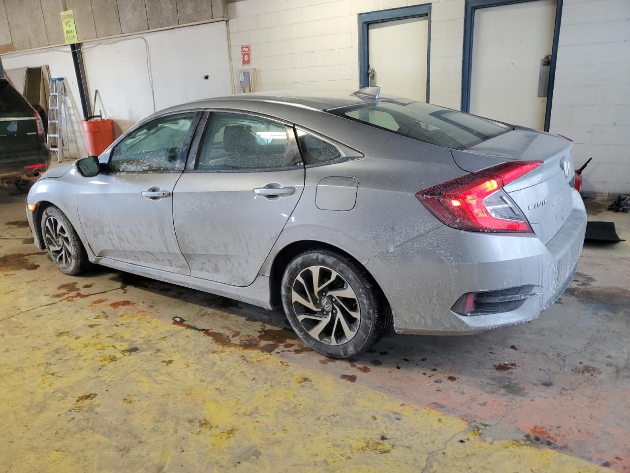 2018 Honda Civic VIN 19XFC2F77JE022989 Copart auction photo, front end / minor dent/scratches damage thumbnail 2