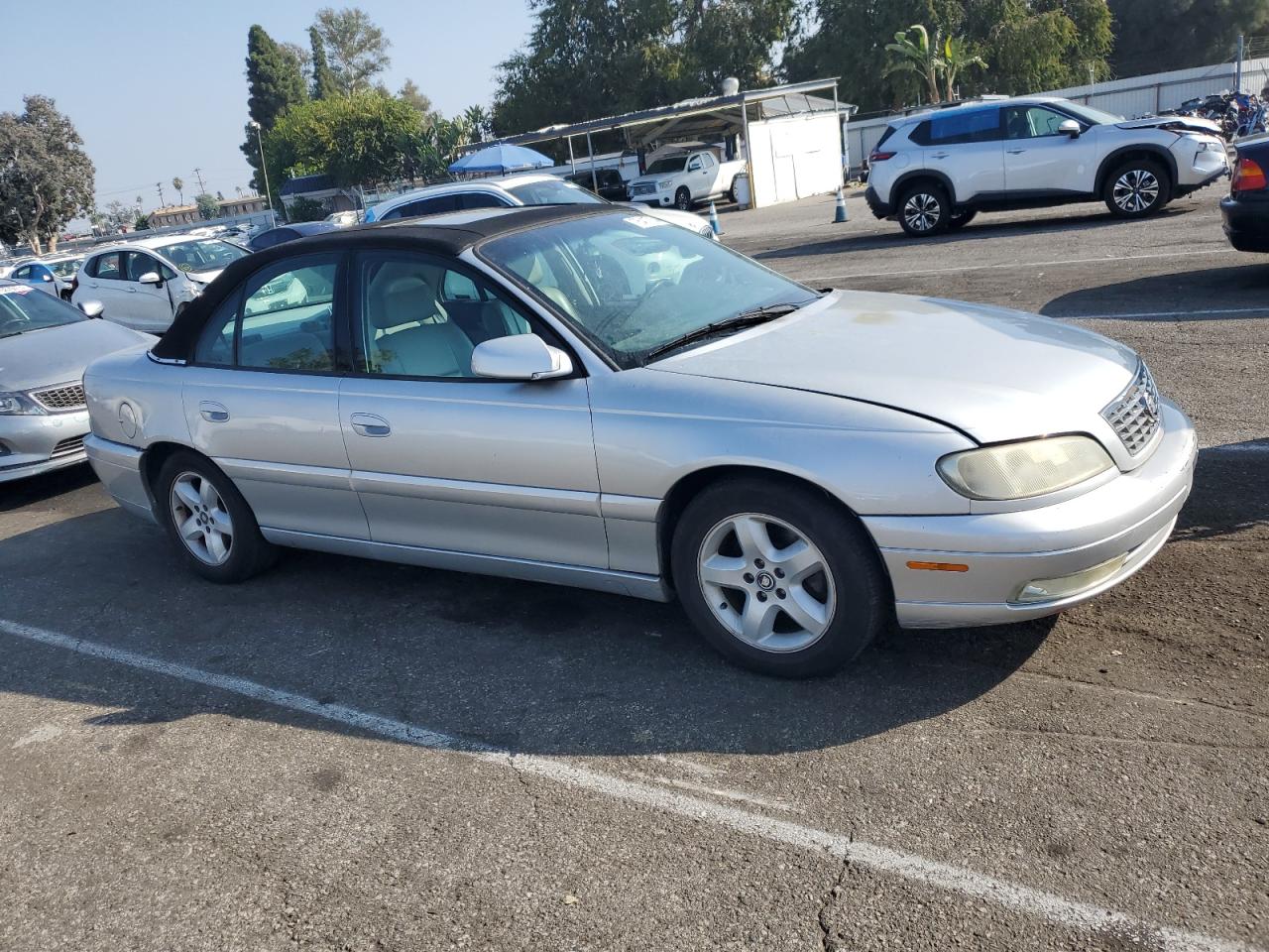 2000 Cadillac Catera VIN W06VR54R1YR003905 Copart auction photo, burn - engine / minor dent/scratches damage thumbnail 4