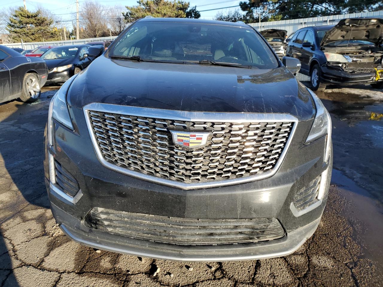 2021 Cadillac XT5 VIN 1GYKNDRS6MZ111640 Copart auction photo, side / rear end damage thumbnail 5