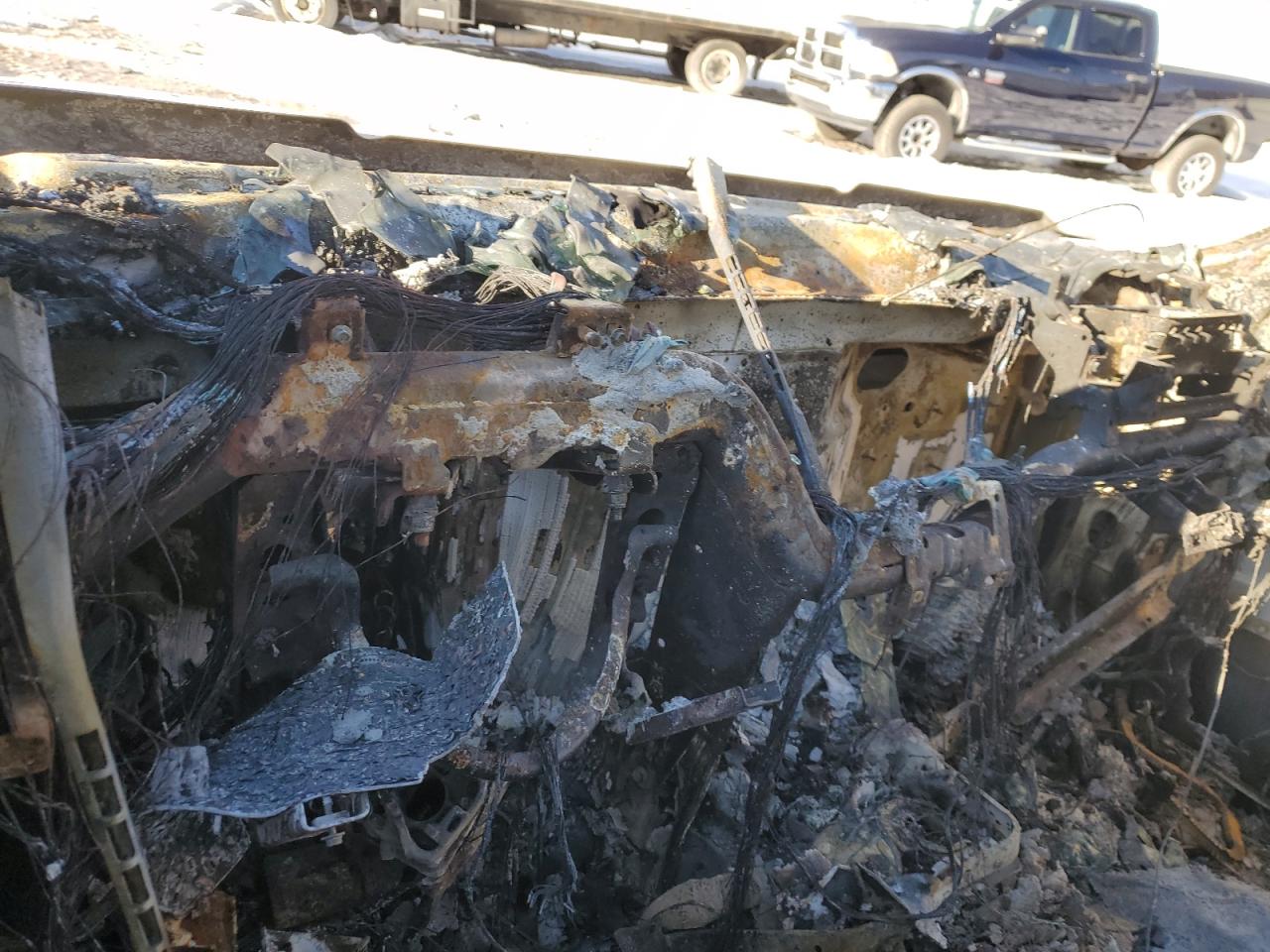 2007 Chevrolet Silverado VIN 2GCEK13M471548098 Copart auction photo, burn damage thumbnail 9